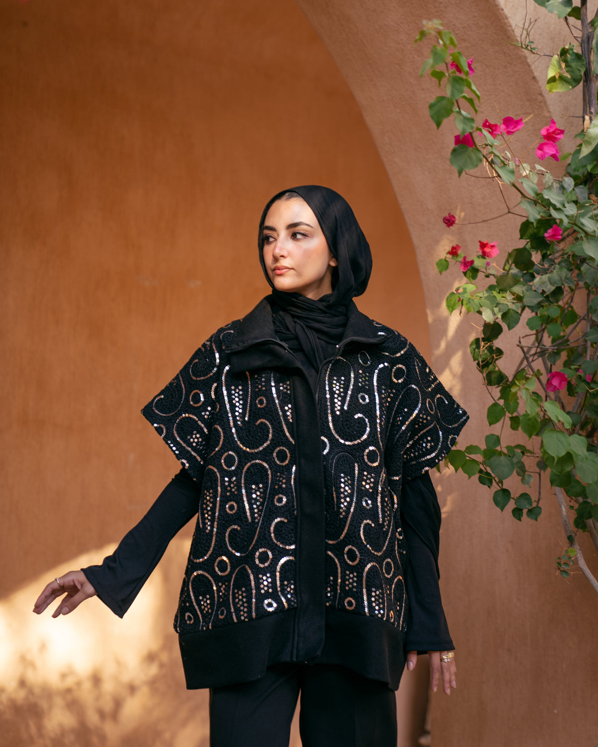 Model wearing The Show Off – Black from Pose Winter '27 – view 7