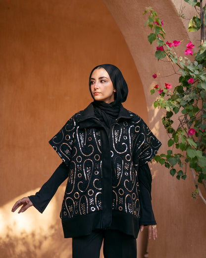 Model wearing The Show Off – Black from Pose Winter '27 – view 7