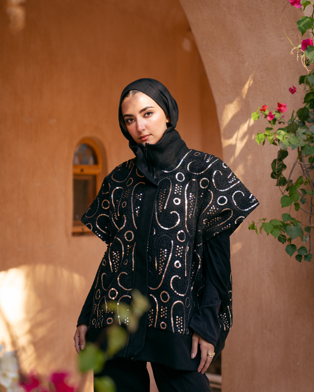 Model wearing The Show Off – Black from Pose Winter '27 – view 9