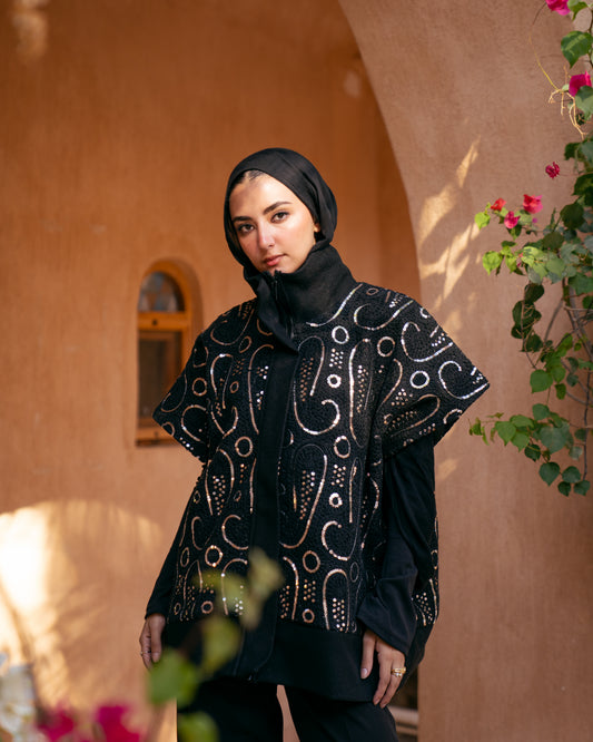 Model wearing The Show Off – Black from Pose Winter '27 – view 9