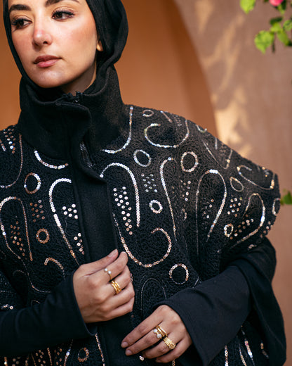 Model wearing The Show Off – Black from Pose Winter '27 – view 11